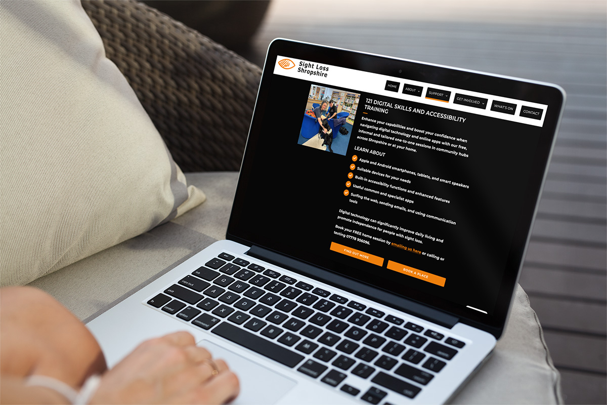 Sight Loss Shropshire’s website A page of the Sight Loss Shropshire's website that some one is looking at in a laptop.