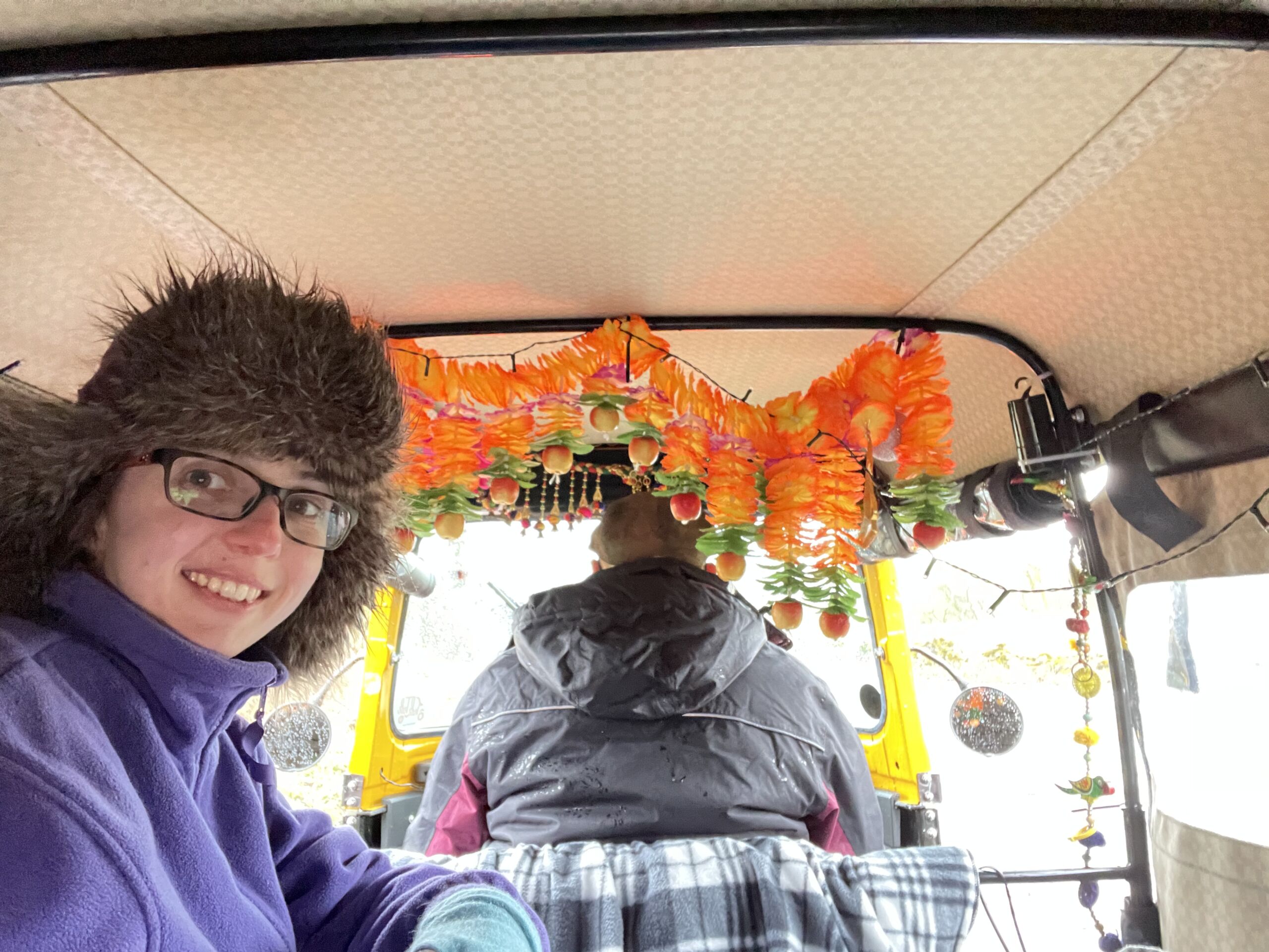 Wbsite designer Vicky Jackson in the back of a TukTuk on a charity challenge in 2022.